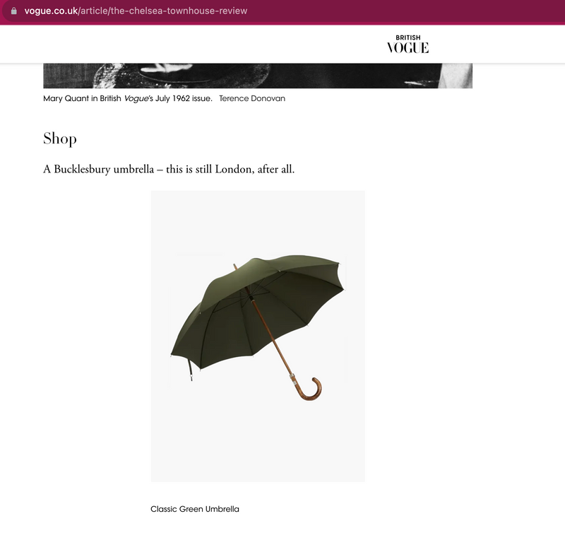 Klassischer grüner Regenschirm 